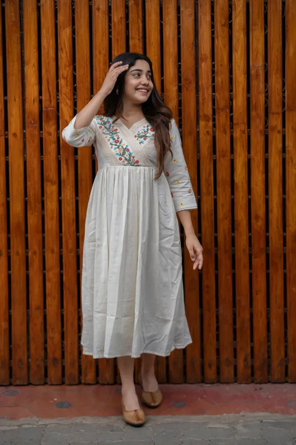 Off white cotton dress with floral embroidery and crochet lace detailings
