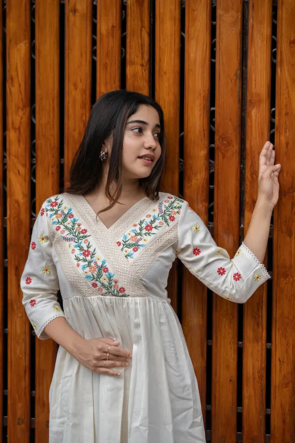 Off white cotton dress with floral embroidery and crochet lace detailings