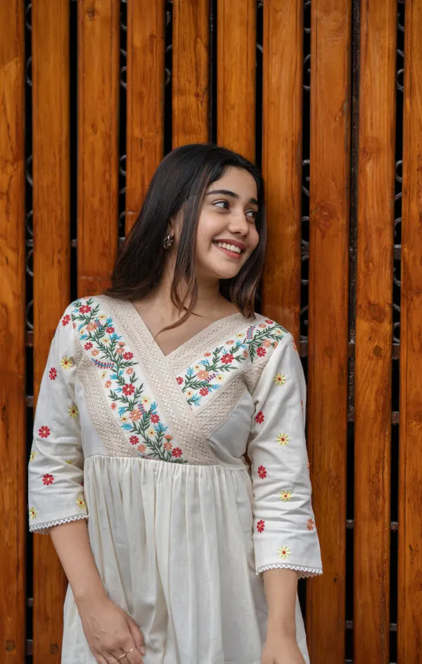 Off white cotton  dress with floral embroidery and crochet lace detailings